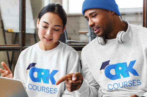 Two healthcare professionals exploring CRK Courses for online medical training in Kenya