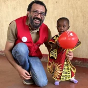 Smiling child with congenital heart disease supported by heart surgery mission in Kenya.