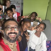 Heart surgery mission team celebrating with local volunteers in Kenya.