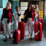 International heart surgery volunteers arriving in Kenya with medical equipment.